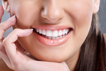 A female patient of Dr. Mona, DDS & DMD.