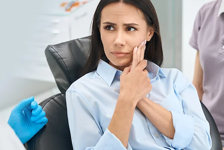 woman with jaw pain